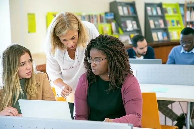 three woman discuss about CMRP exam materials before joining CMRP computer based certification exam