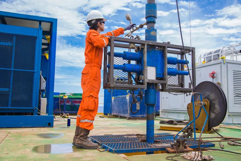 an engineer performing well completion and workover