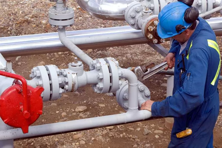 engineers perform hydrostatic testing on the pipes