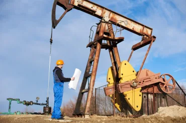 petroleum-engineer-controlling-work-oil-well-pump-jack