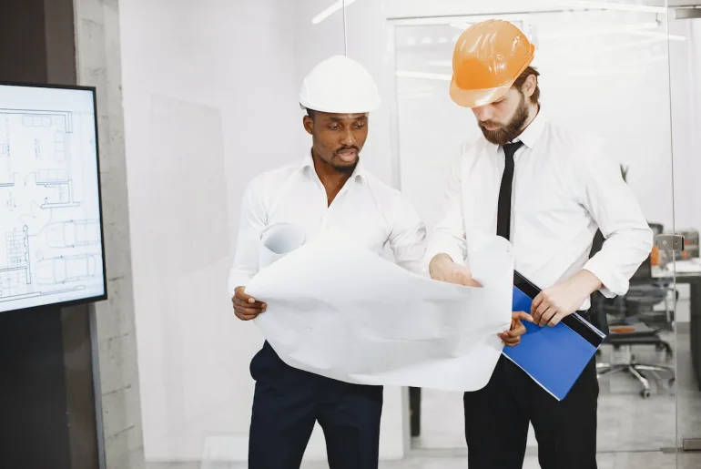 engineers reviewing cmrp certification requirement